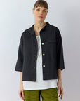 Front view of Yaccomaricard Faneru Jersey Jacket in Black showing soft cotton fabric and relaxed shape.