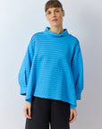 Yaccomaricard Spring Summer 26 Sode jersey pullover in Hana blue with horizontal pintucks.