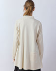 Back view of Yaccomaricard Cotton Jersey A-line Overshirt in Jasmine White featuring a single pintucked back pocket.