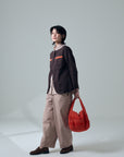 Zanpu bucket bag in dark orange by Yaccomaricard, repurposing leftover fabrics from Yaccomaricard’s own manufacturing process