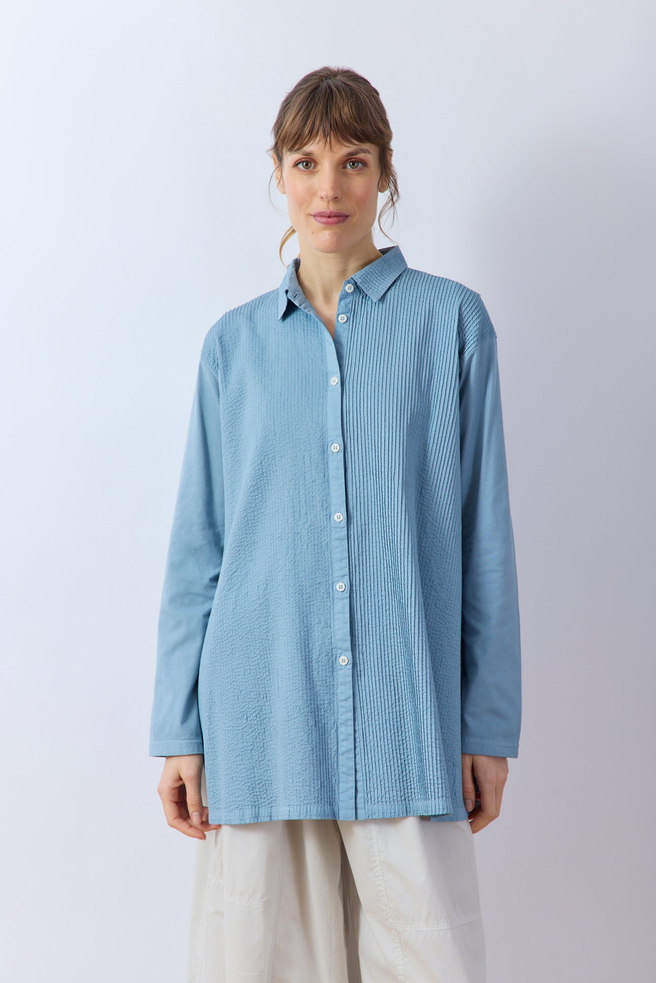 Yaccomaricard pintucked Cotton Jersey + Lawn A-line Overshirt in Smoky Blue with Pintucks running vertically on the lawn front.