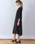 Side view of Yaccomaricard pocket dress with relaxed drape and side pocket.