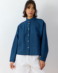 Front view of Bibbu Shirt in agate blue by Yaccomaricard London with pintuck panel detailing on cotton lawn.