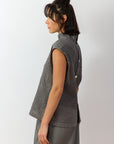 Side view of Shibo Shell Top in Ash highlighting off-body fit and grown-on sleeve silhouette.