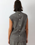 Back view of Ash Shibo Shell Top showing full back button-through and sculptural shape.