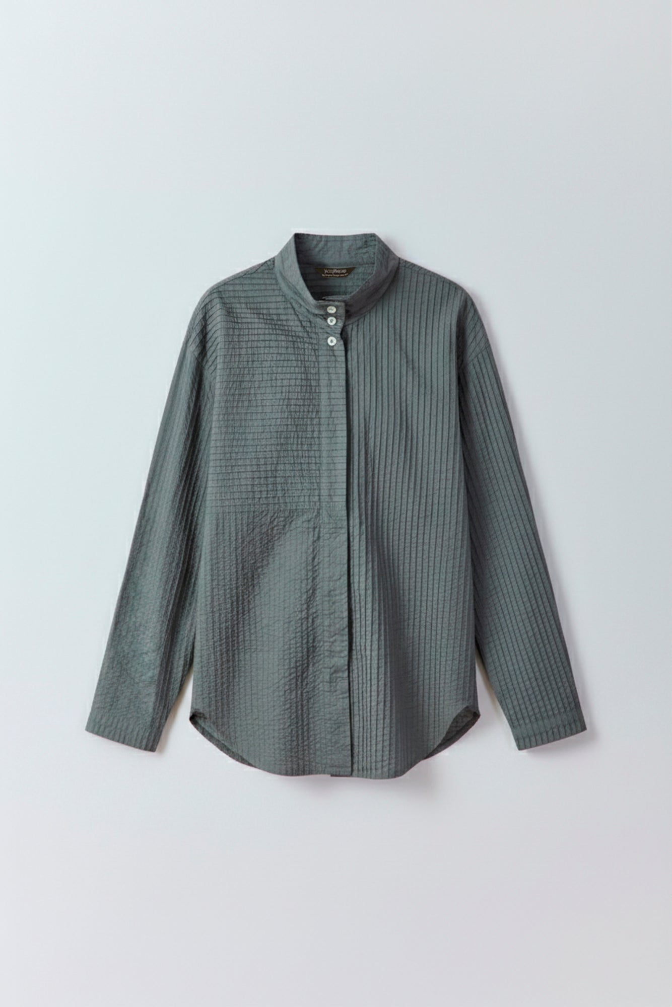 Flat lay showing fabric texture of 100% cotton Nikku Shirt by Yaccomaricard London.