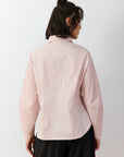 Back view of Yacco Maricard Wanda Shirt highlighting the alternating panels of smooth and finely pintucked cotton in Sakura pink.