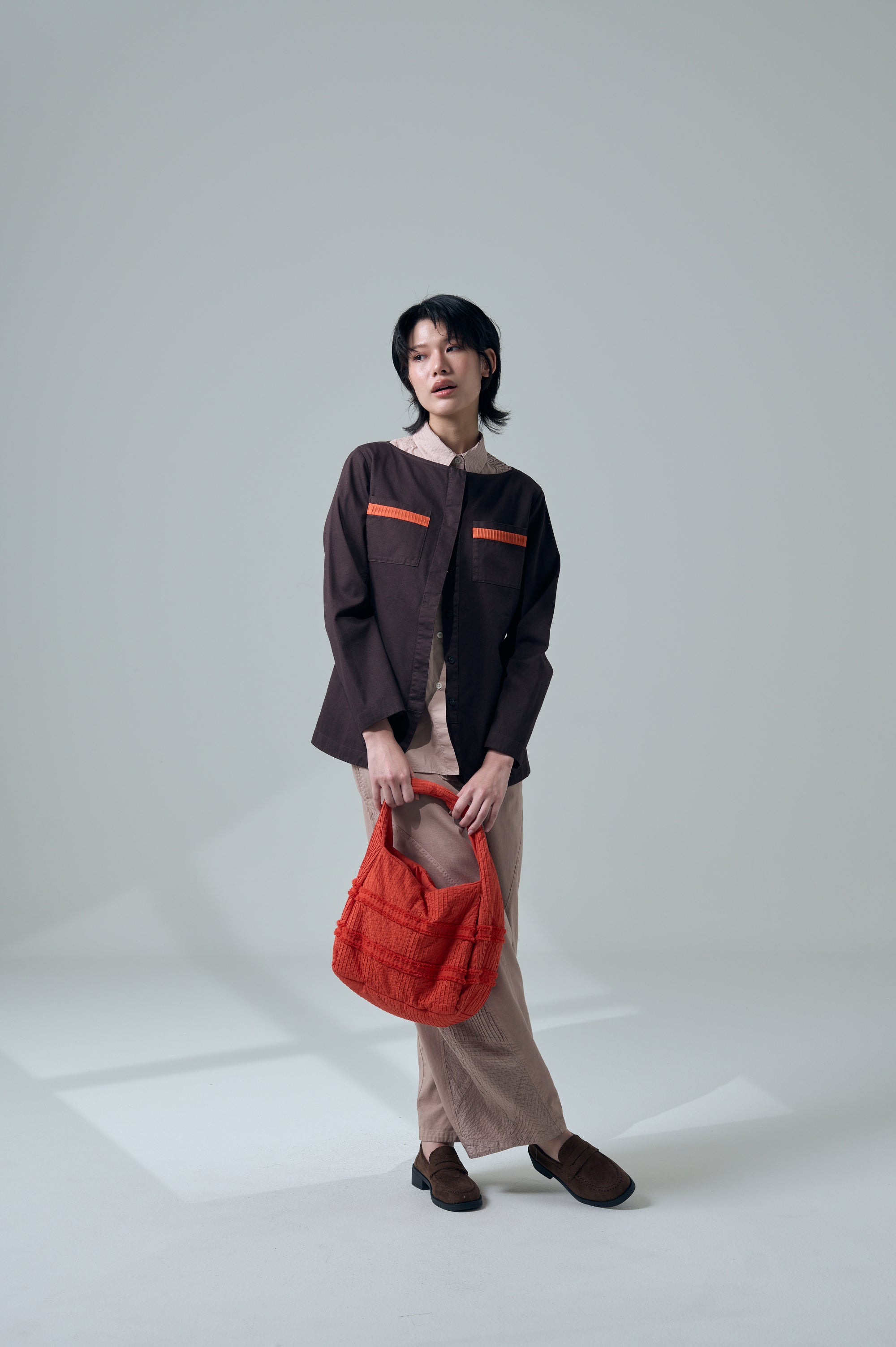 Zanpu bucket bag in dark orange by Yaccomaricard easy to carry and lightwear
